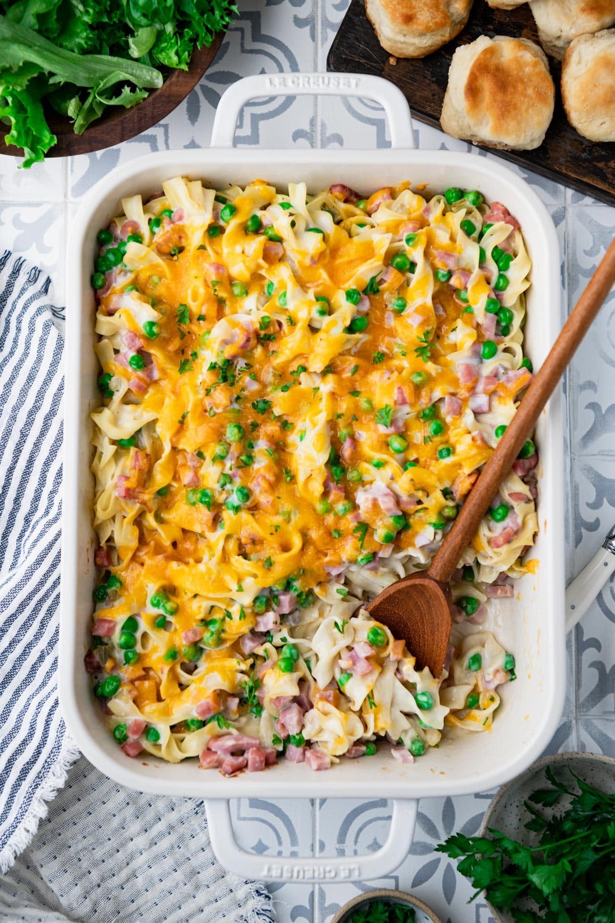 Overhead shot of easy ham noodle casserole with peas.