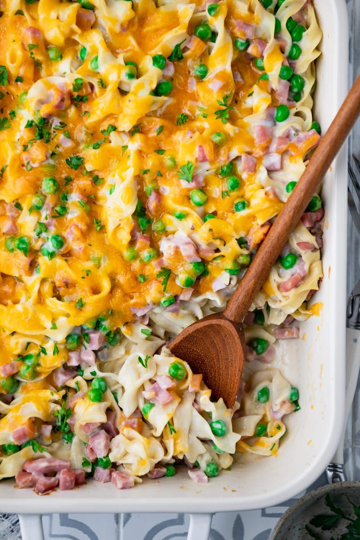 Close overhead image of a dish of ham and noodle casserole.