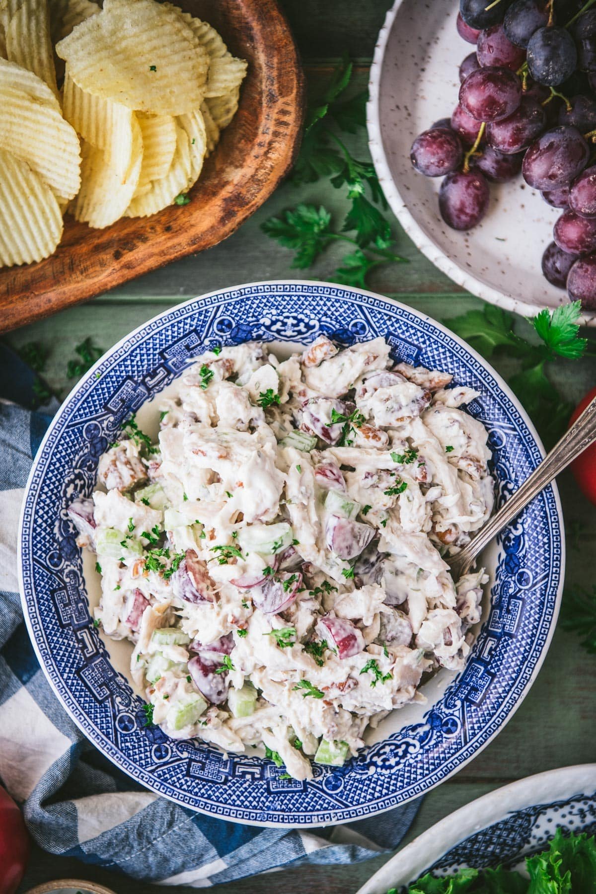 Overhead shot of greek yogurt chicken salad in a blue and white bowl.