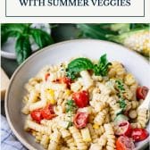 Bowl of boursin cheese pasta with summer vegetables and text title box at top.