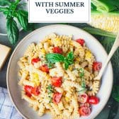 Boursin cheese pasta with summer vegetables and text title overlay.