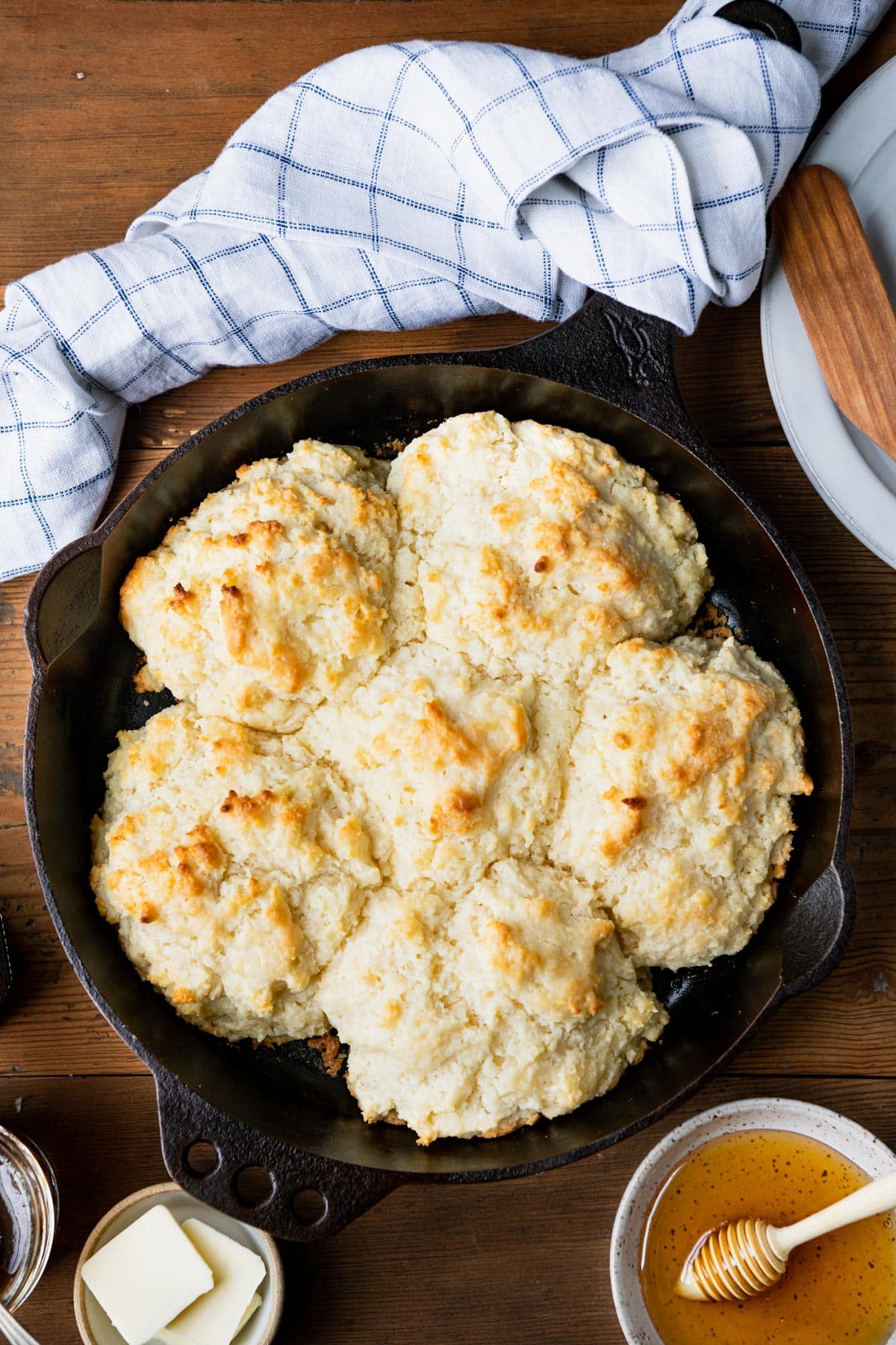 Overhead image of the best cathead biscuit recipe baked in a cast iron skillet.