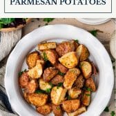 Crispy parmesan potatoes with text title box at top.