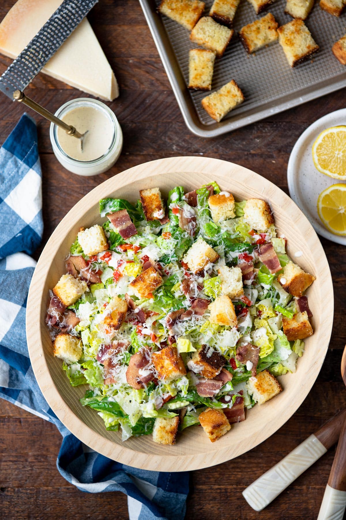 Overhead image of a southern Caesar salad made with cornbread croutons and a creamy Caesar dressing.