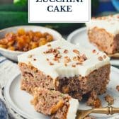 Side shot of zucchini cake with text title overlay.