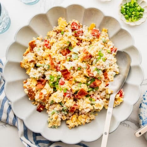 Square overhead shot of a bowl of old fashioned cornbread salad.