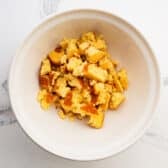 Crumbled cornbread in a big mixing bowl.