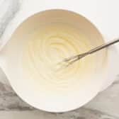 Whisking together the mayo dressing for a cornbread salad.