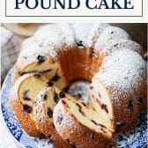 Sliced blueberry pound cake with text title box at top.