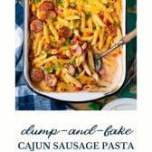 Pan of dump and bake cajun sausage pasta with text title at the bottom.