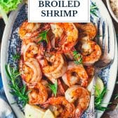 Garlic and rosemary broiled shrimp with text title overlay.