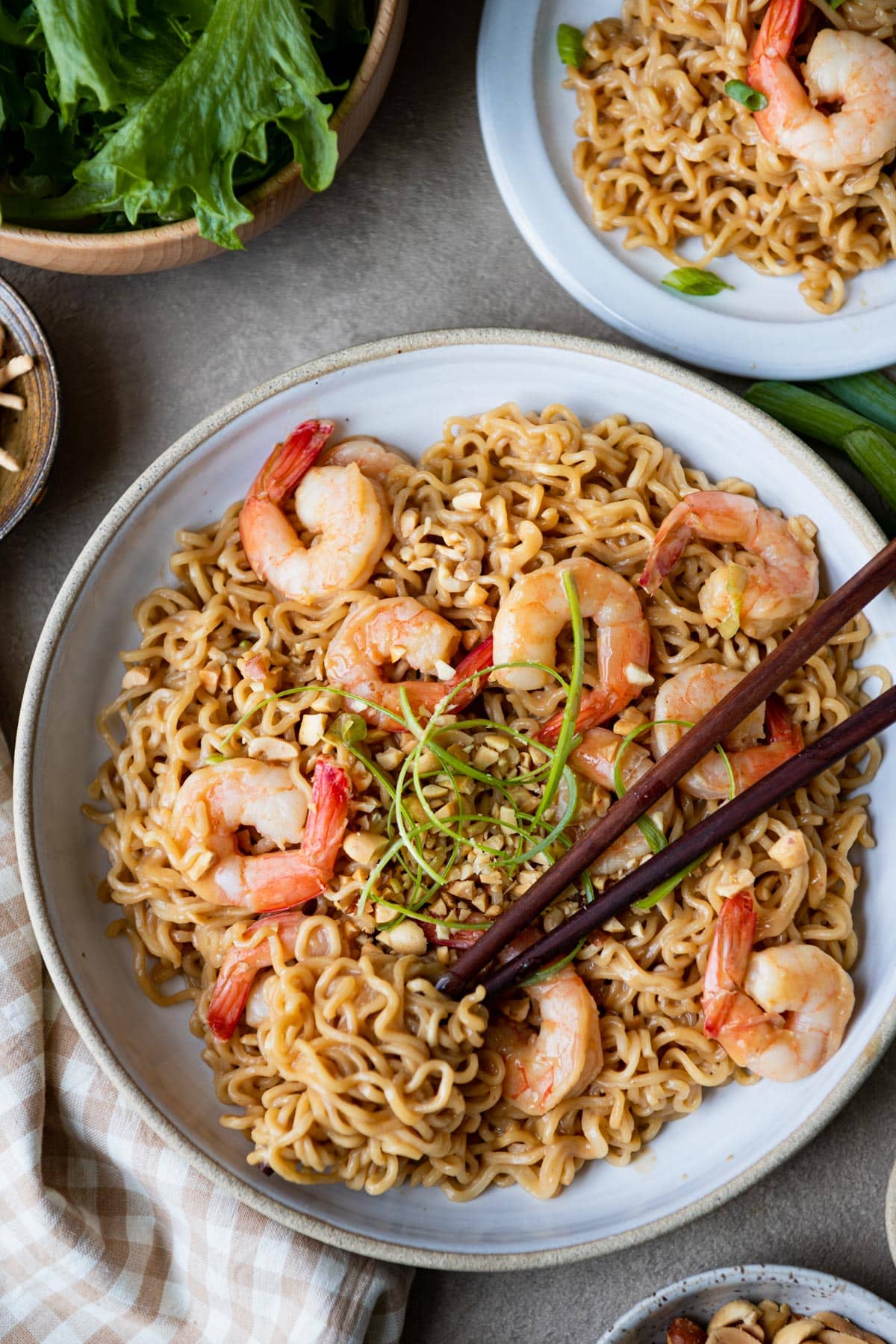 Close overhead image of a bowl of easy shrimp ramen noodles with peanut sauce.