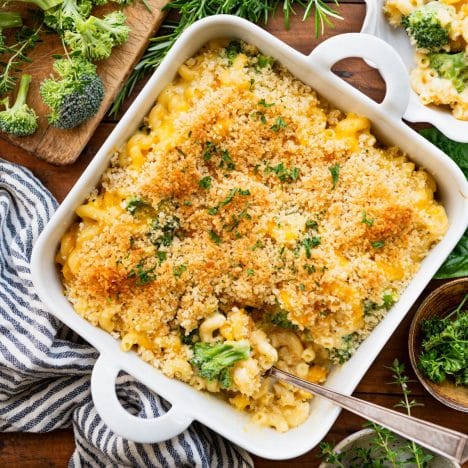 Square overhead shot of a dish of broccoli mac and cheese.