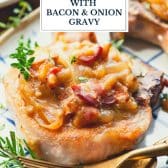 Smothered Crock Pot pork chops with bacon and onion and text title overlay.