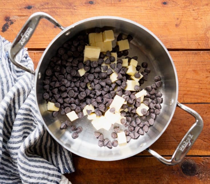 Chocolate chips and butter in a saucepan.