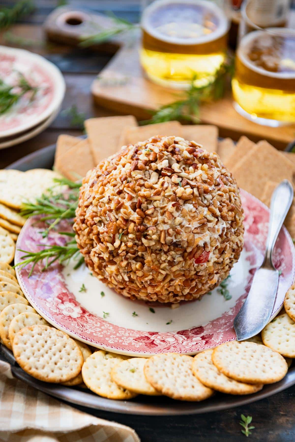 Cheese ball recipe coated in chopped pecans.