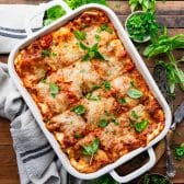 Square overhead image of a white dish full of the best classic lasagna recipe.
