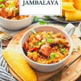 Chicken and sausage jambalaya with text title overlay.