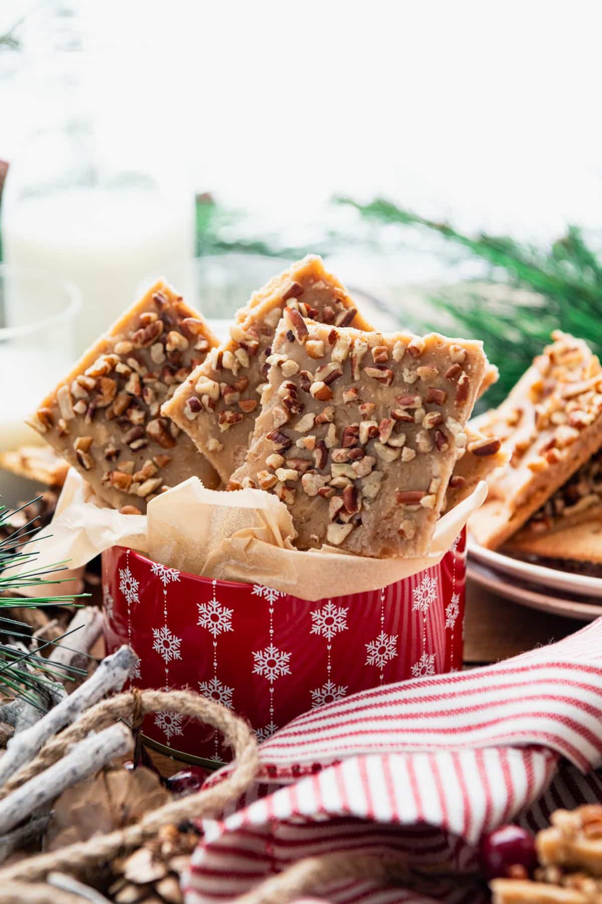Holiday cookie tin full of 4 ingredient graham cracker toffee bars.
