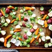 Chopped vegetables on a sheet pan.