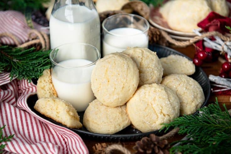 Serving tray of the best drop sugar cookies recipe served with a side of milk.
