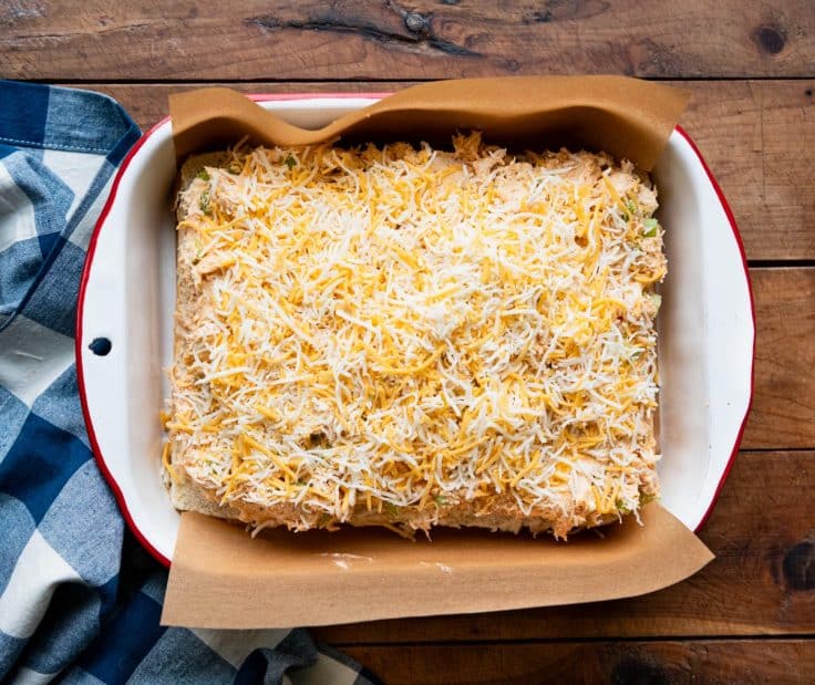 Process shot showing how to assemble buffalo chicken slider recipe.