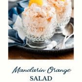 Mandarin orange salad with text title at the bottom.