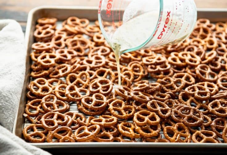 Process shot showing how to make ranch pretzels.