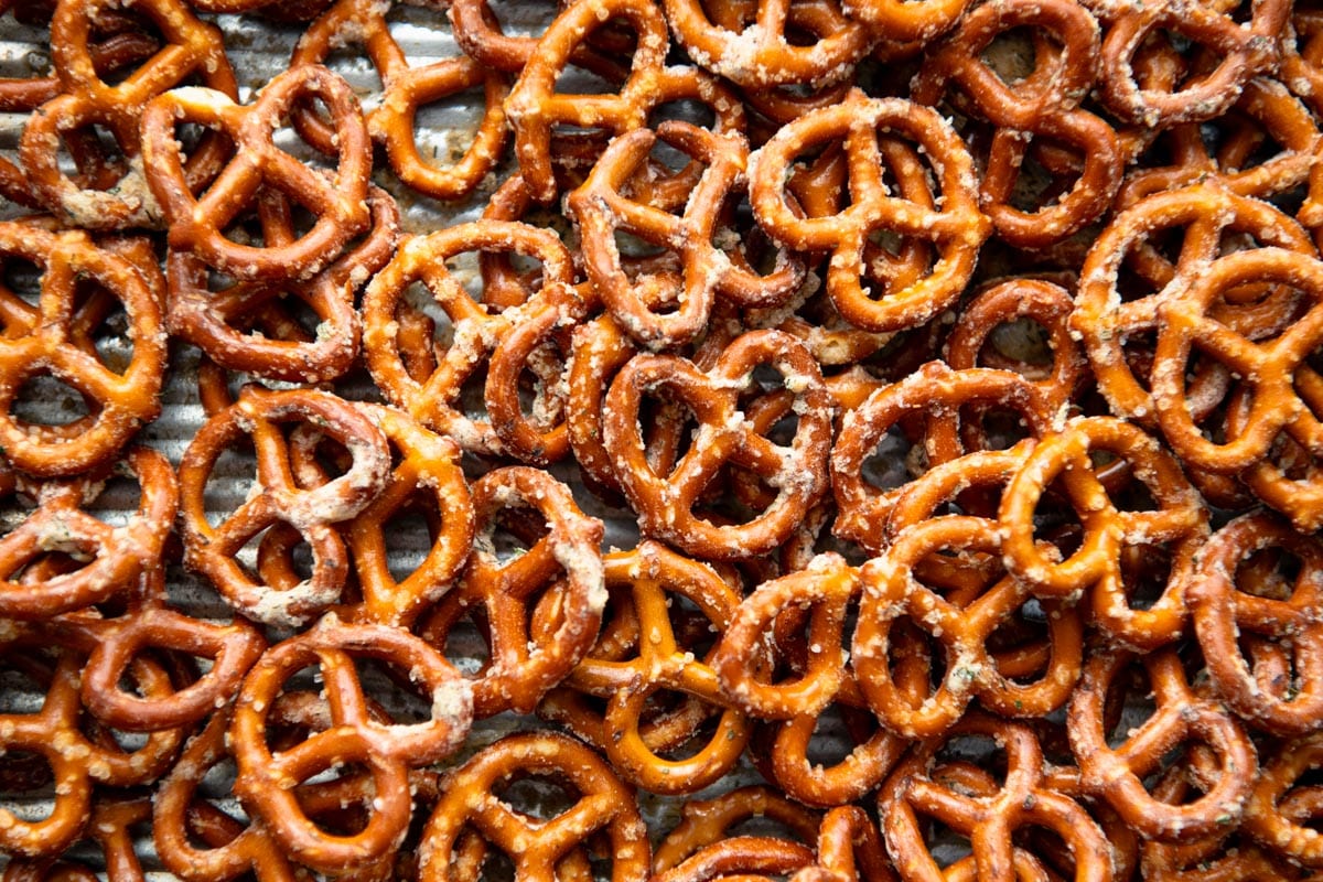 Close up horizontal overhead shot of ranch pretzels on a sheet pan.