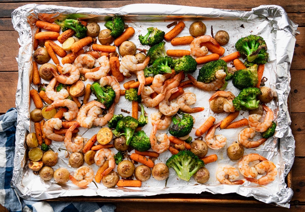 One pan shrimp and vegetables after roasting in the oven.