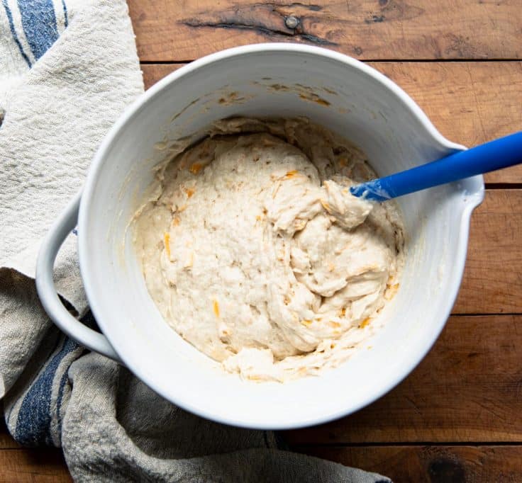 Bowl of batter for bisquick cheddar biscuits.