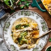 Overhead image of a bowl of the best chicken and orzo casserole recipe.