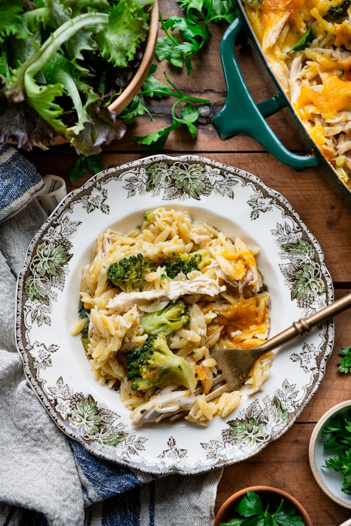 Overhead image of a bowl of the best chicken and orzo casserole recipe.
