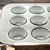 Muffin tin with paper liners.