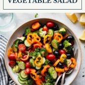 Marinated vegetable salad with text title box at top.
