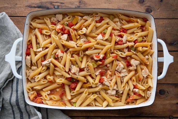 Process shot showing how to make buffalo chicken pasta casserole.