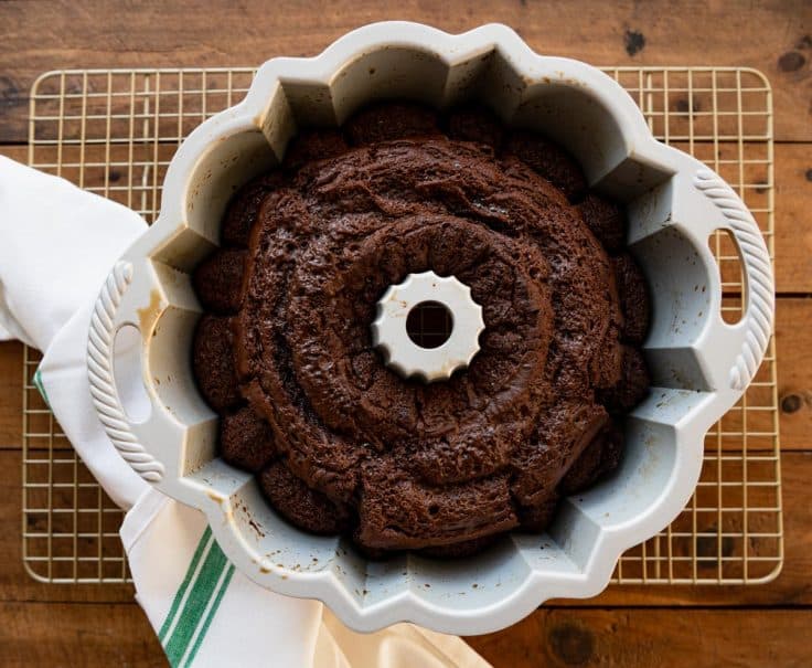 Baked chocolate Bundt cake in a pan.