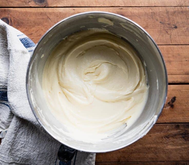 Almond pound cake batter in a large mixing bowl.