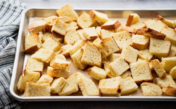 Toasting brioche bread cubes.