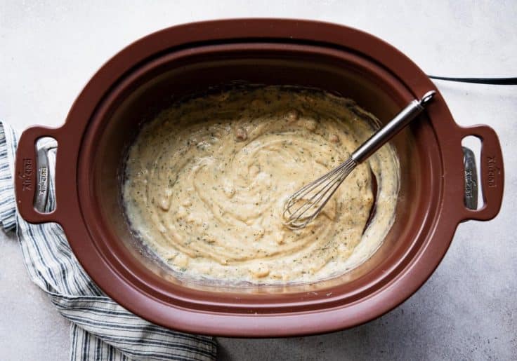 Process shot showing how to make a ranch chicken crock pot recipe.