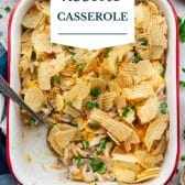 Tuna noodle casserole with text title overlay.