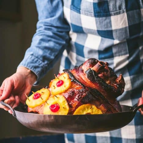 Cook serving a pineapple glazed ham for a collection of easter brunch recipes.