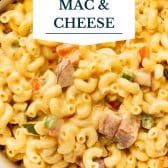 Cajun mac and cheese with text title overlay.