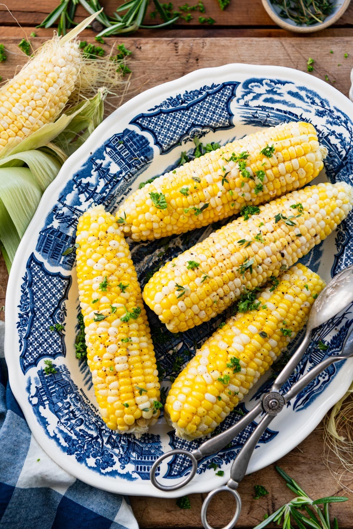 Overhead image of oven roasted corn on the cob served on a plate.