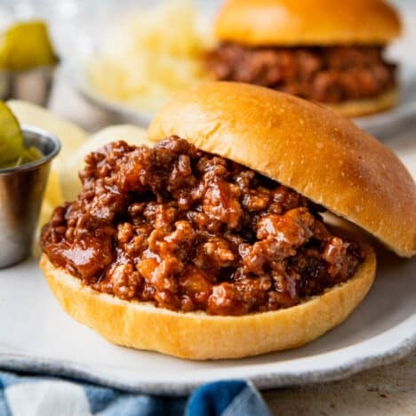 Square close up of homemade sloppy joes on a plate.