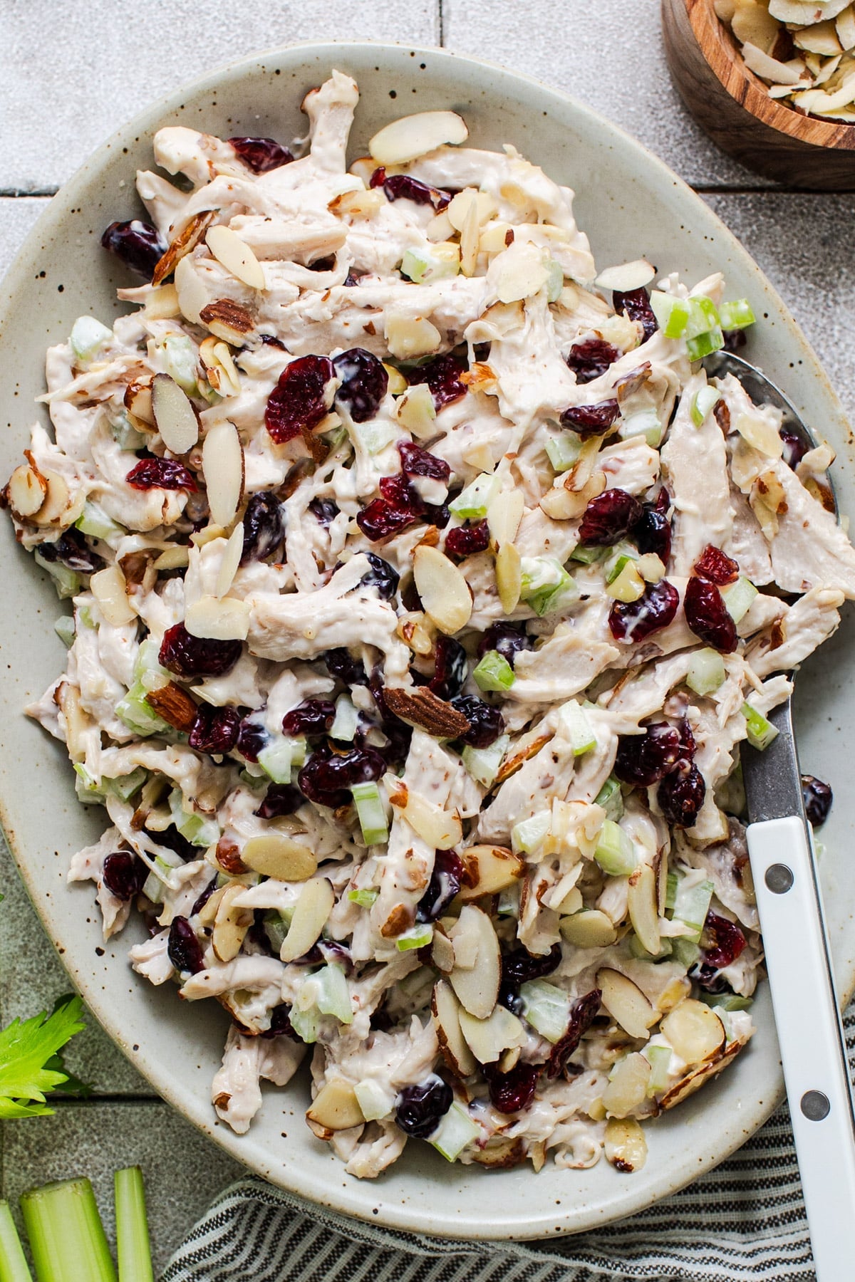 Close overhead shot of a serving bowl full of the best Southern chicken salad recipe.