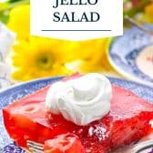 Strawberry jello salad with text title overlay.