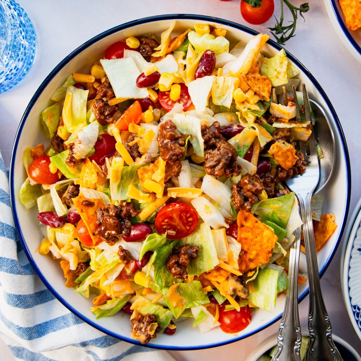 Square overhead shot of a bowl of Dorito taco salad.