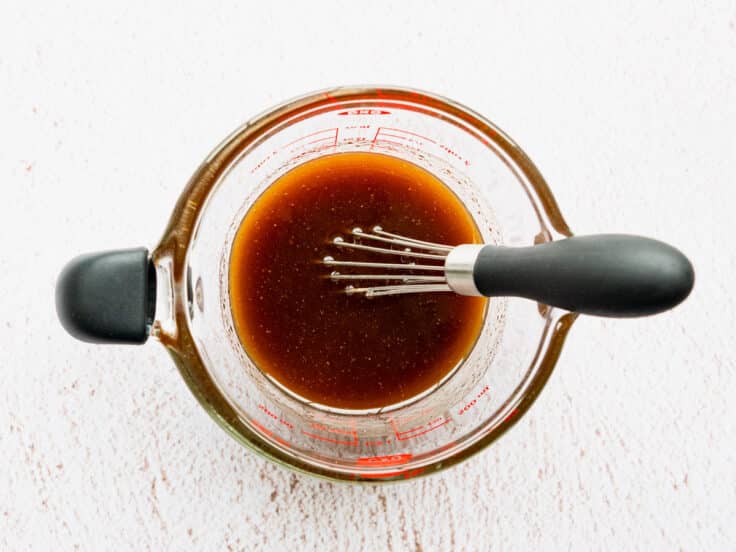 Whisking together a simple steak marinade recipe.