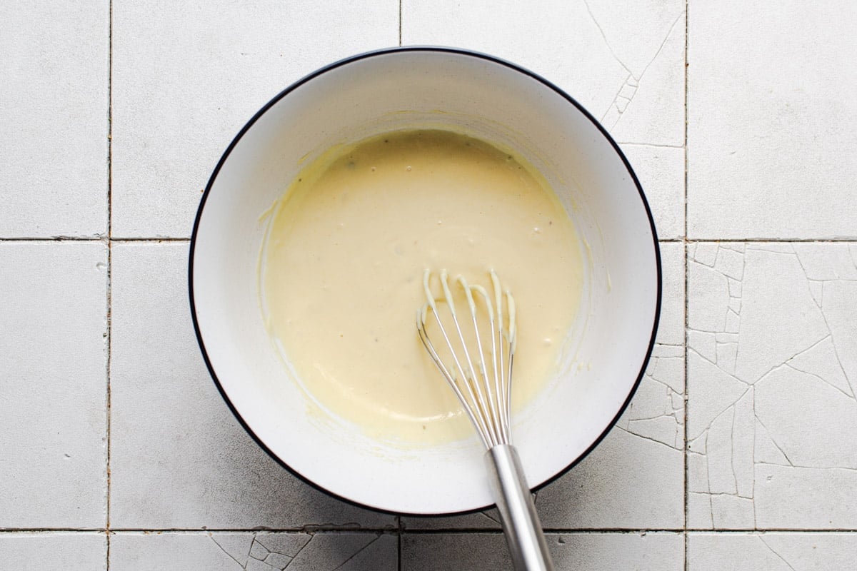 Whisking together the dressing for a Southern macaroni salad.